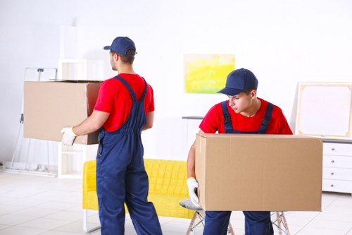 Man and van loading furniture in Gants Hill