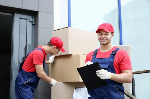 Office removal team handling desks and equipment in the Gants Hill area