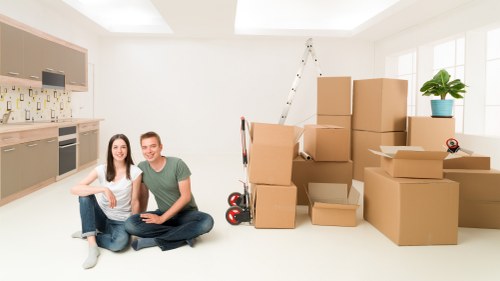 Packed office furniture and equipment prepared for a business move