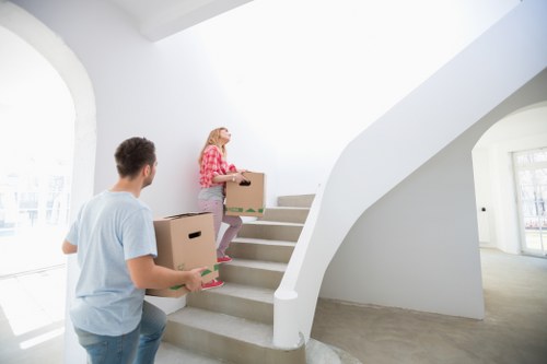 Local moving team assisting with furniture transport around Gants Hill