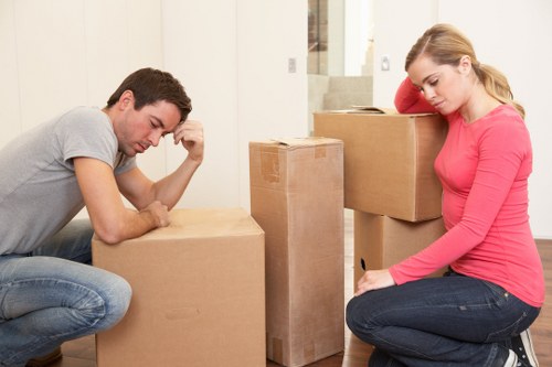 Careful loading of furniture into a moving van in Gants Hill