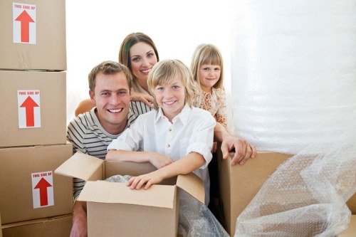 Packed boxes and furniture ready for removals in Gants Hill