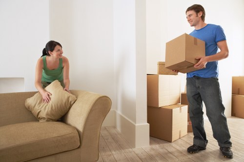 Office moving team handling furniture and equipment near Gants Hill